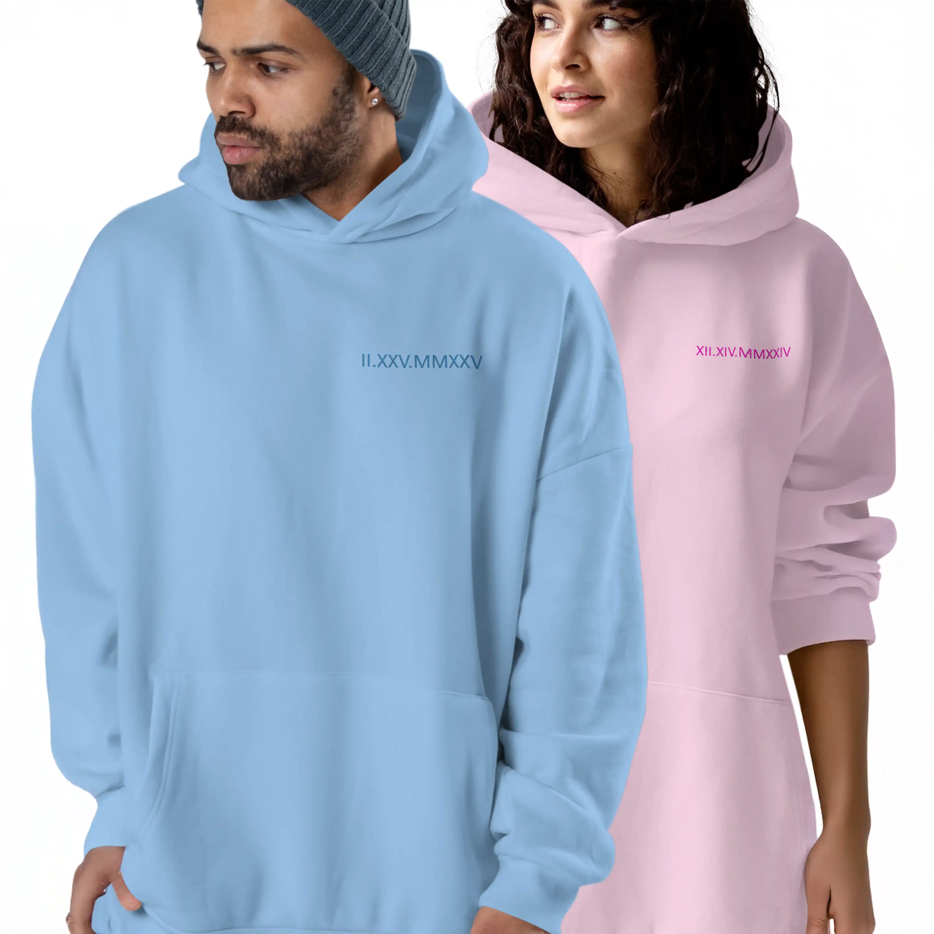 Two people wearing light blue and pink hoodies with Roman numeral designs.