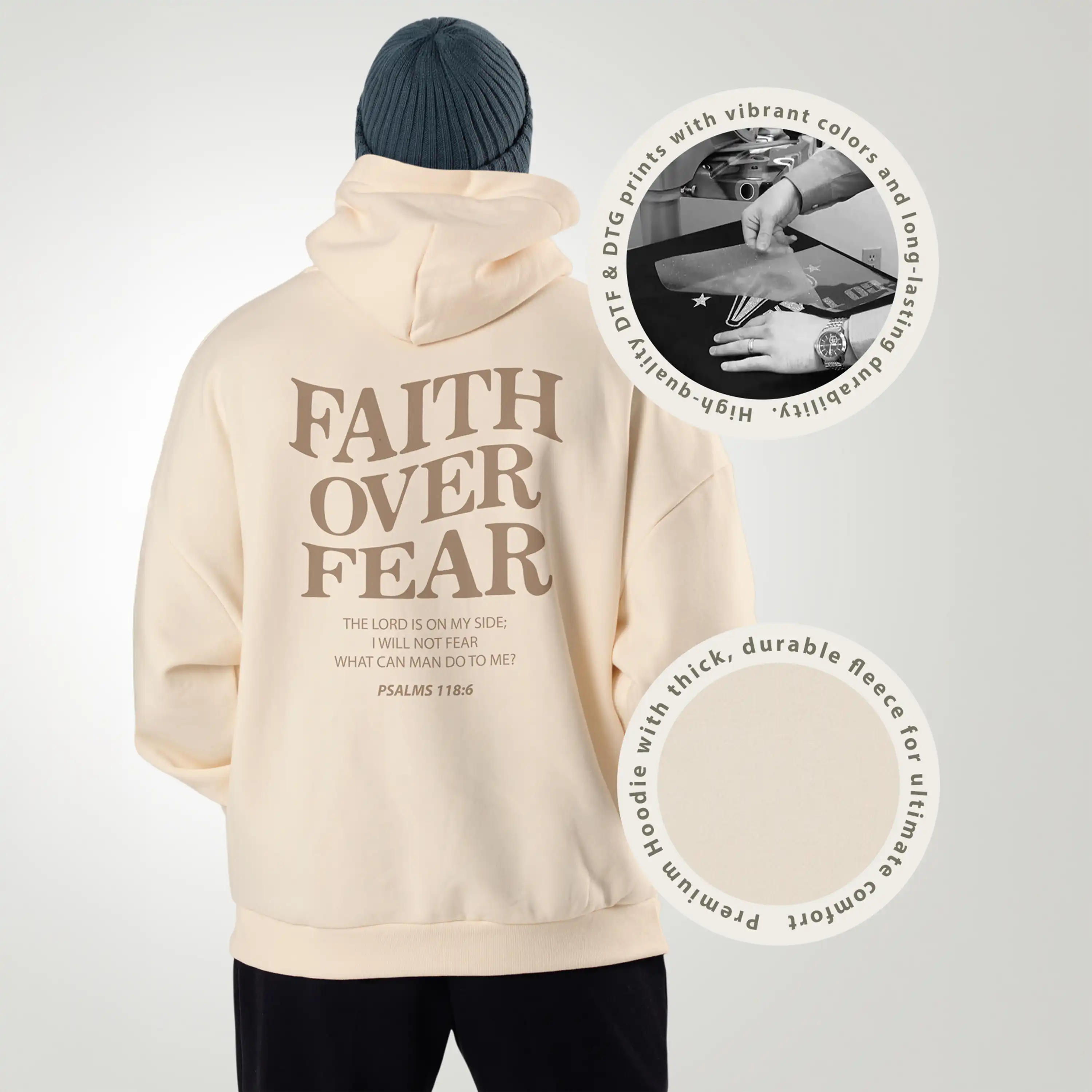 Beige hoodie with 'Faith Over Fear' text, worn by a person, on a light gray background.
